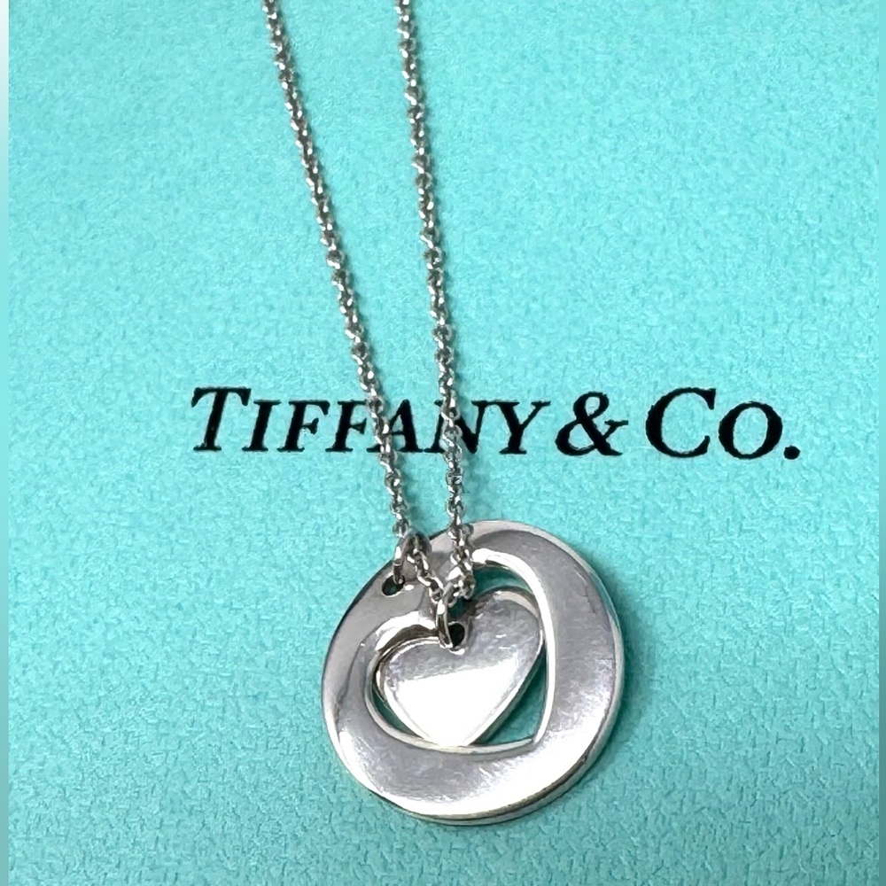 Authentic Tiffany &Co Stencil Cutout Two Heart Charm Necklace.